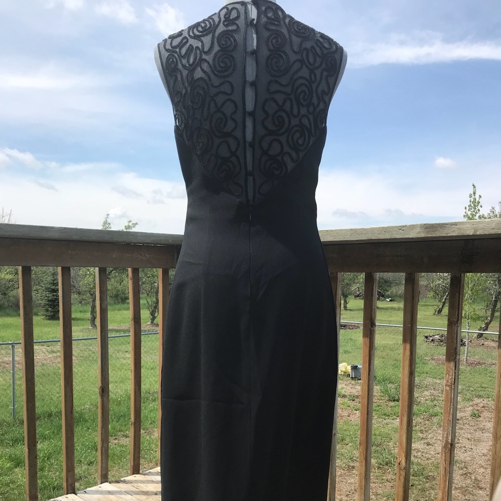 Elegant black dress with lace & button back
